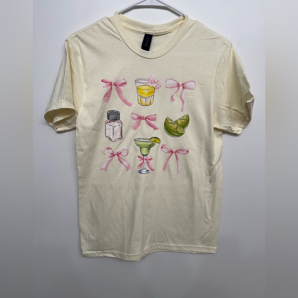 Cream Shirt with Pink Bow Design